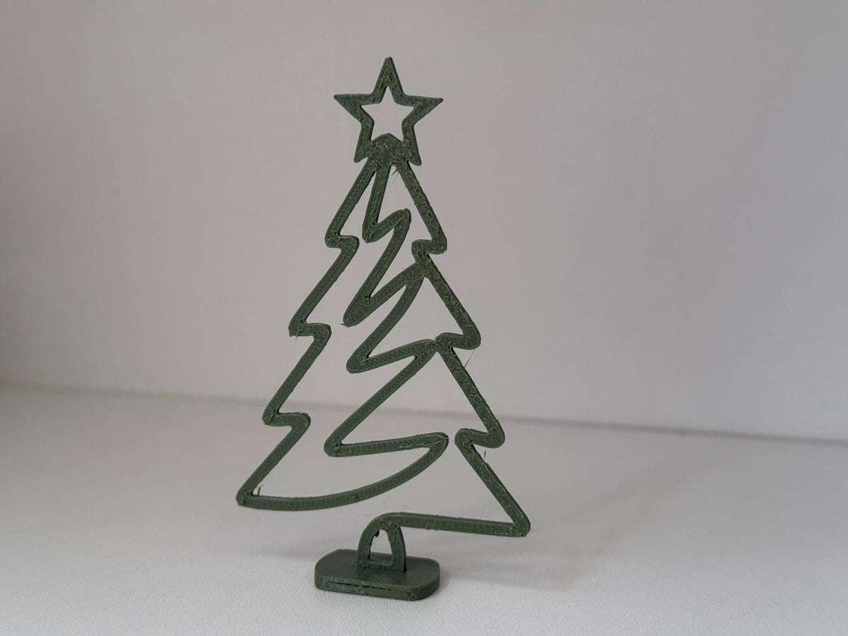 Minimalist Christmas tree figure with star and stand