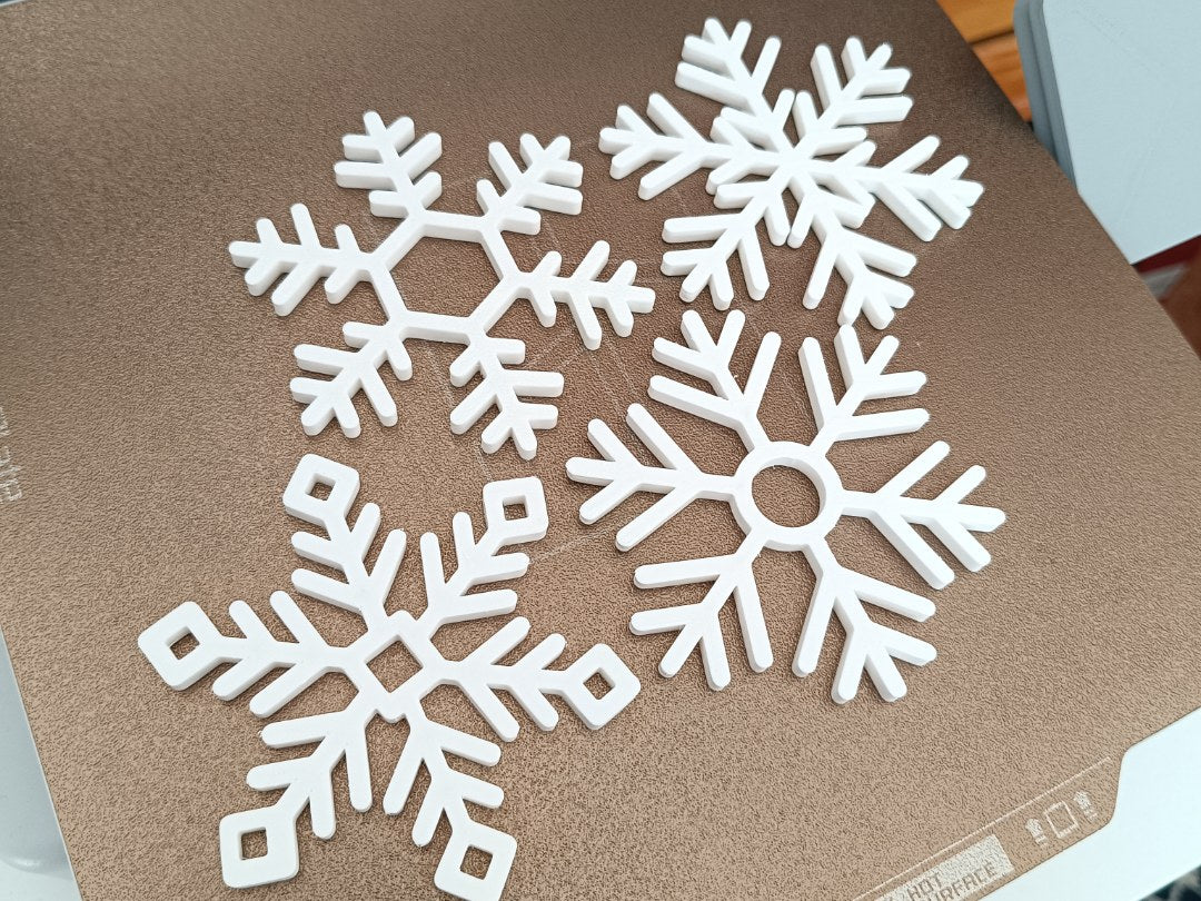 Set of 4 snowflake-shaped coasters