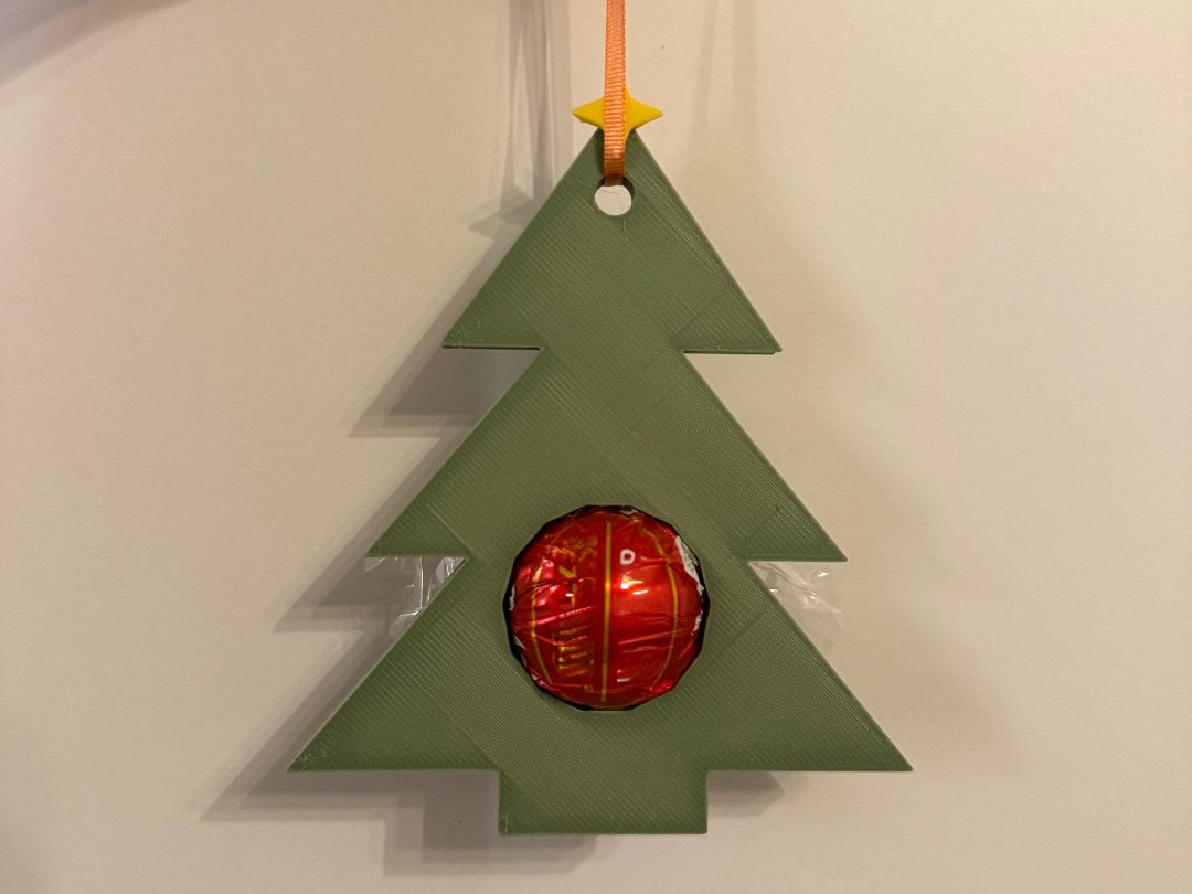 Christmas tree gift tag with space for a chocolate ball