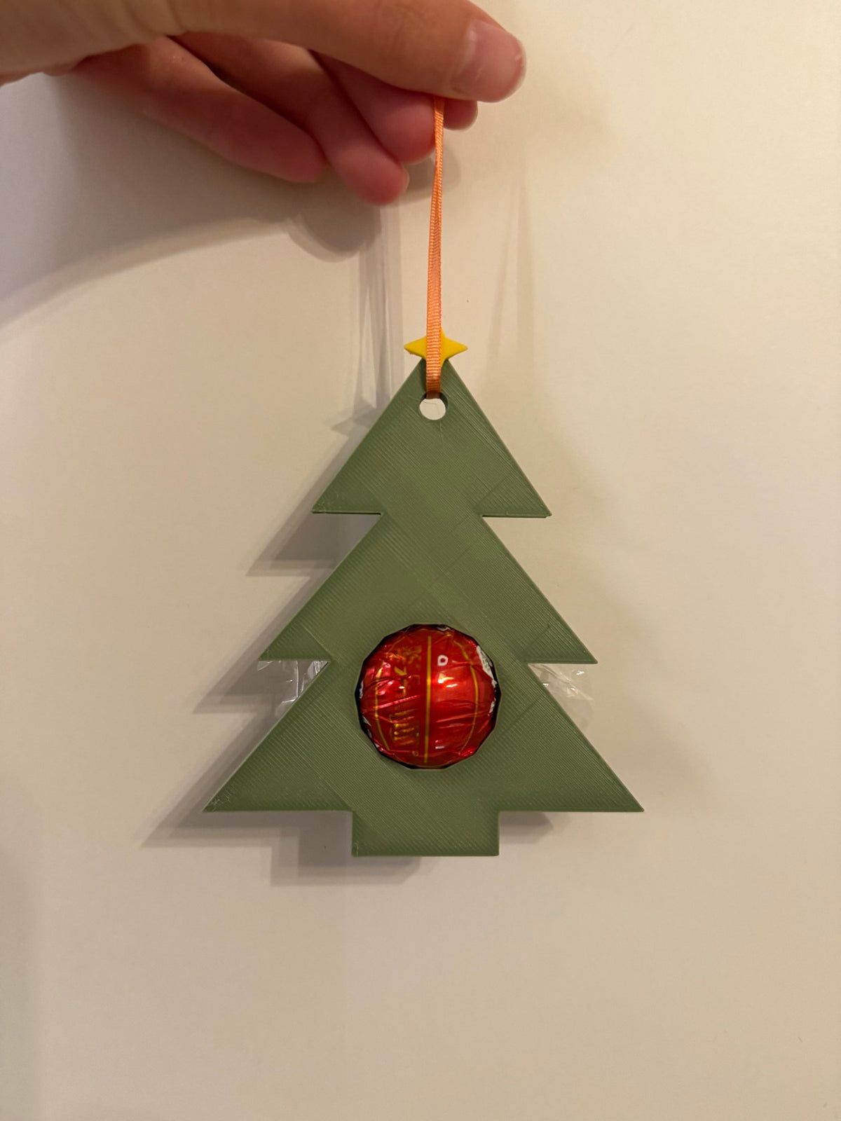 Christmas tree gift tag with space for a chocolate ball