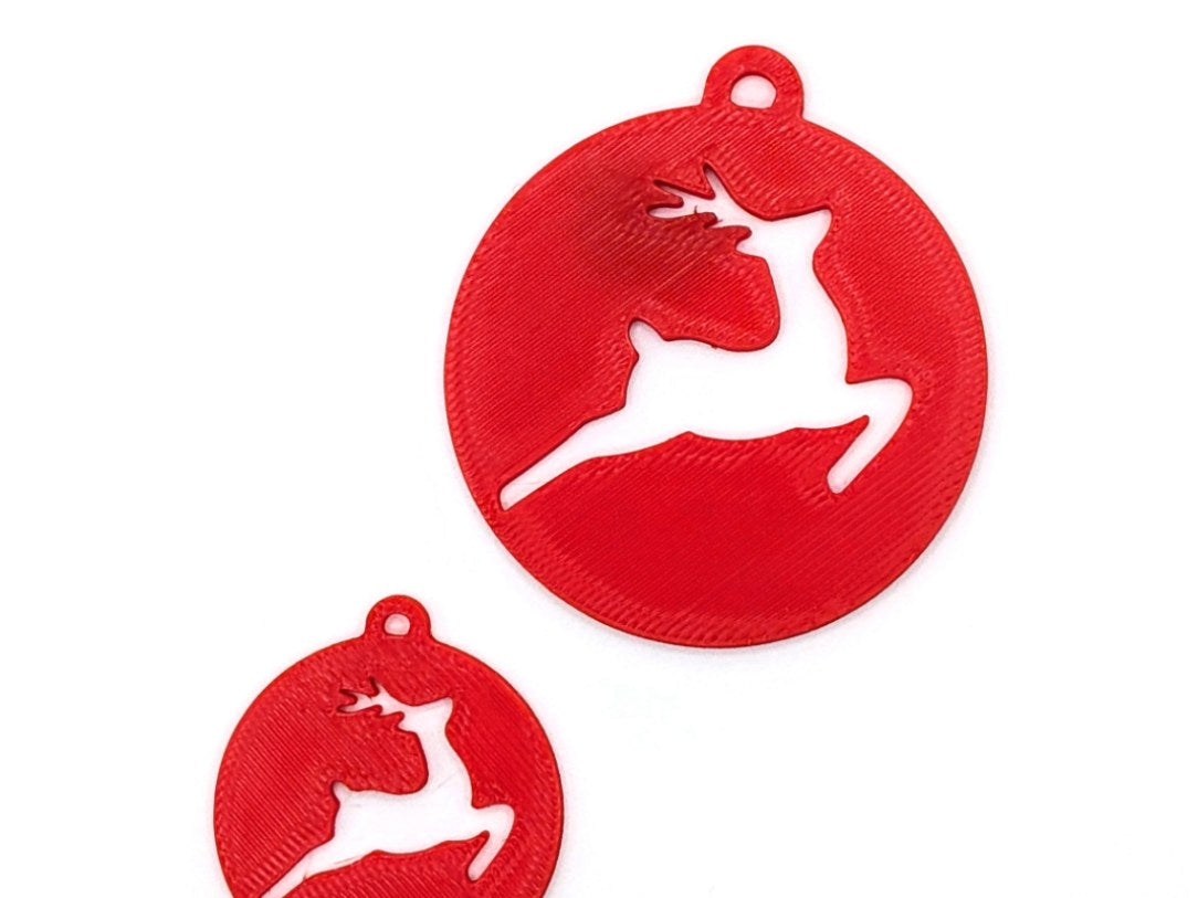 Gift tag with cut-out leaping reindeer