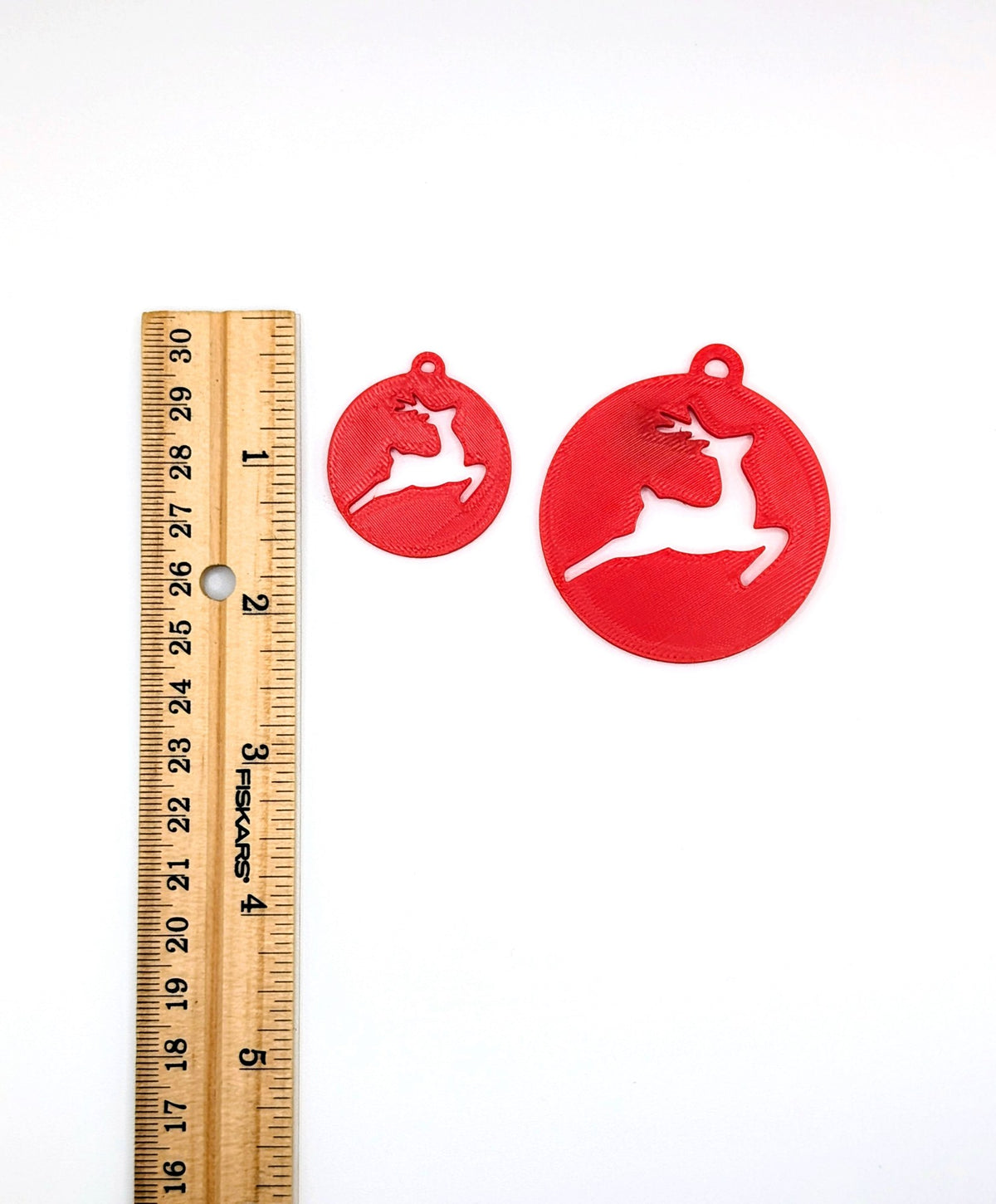 Gift tag with cut-out leaping reindeer