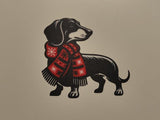 Wall decoration with a dachshund in a festive Christmas mood