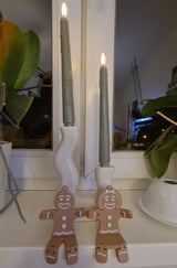 Gingerbread woman figure for Christmas in brown and white