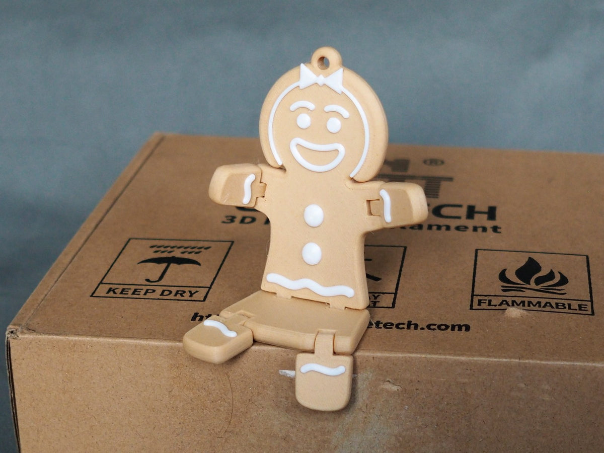 Gingerbread woman figure for Christmas in brown and white