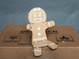 Gingerbread woman figure for Christmas in brown and white