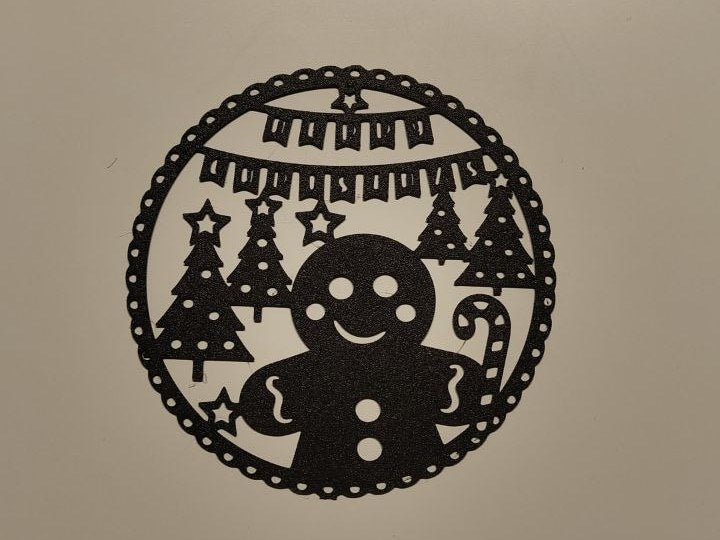 Gingerbread man silhouette as Christmas wall decoration