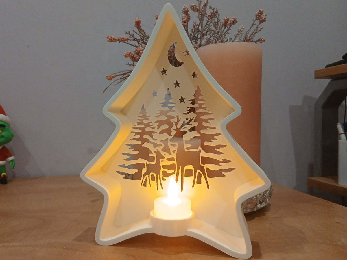 Christmas tree tealight holder with forest scene and reindeer