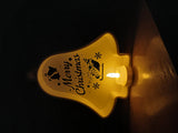 Christmas bell with cut-outs and LED tealight