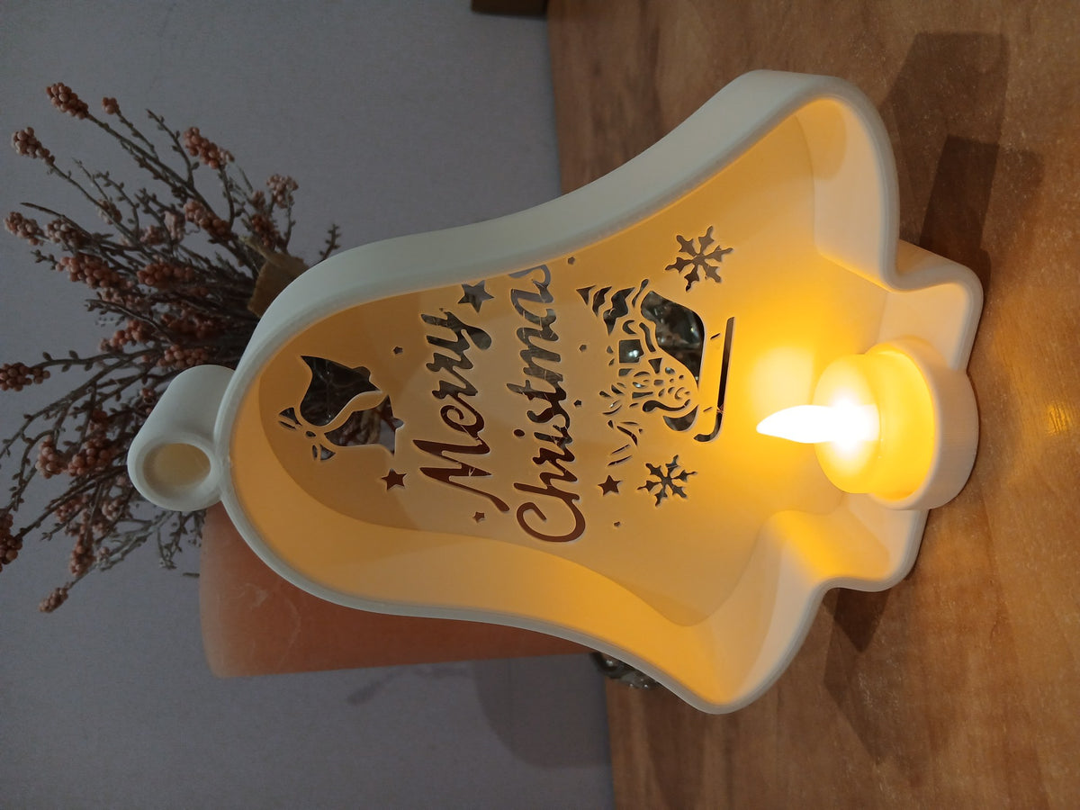 Christmas bell with cut-outs and LED tealight