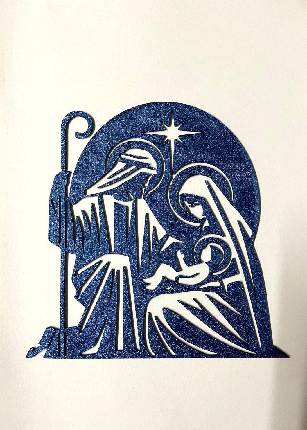 Nativity silhouette with Joseph, Mary, baby Jesus and star