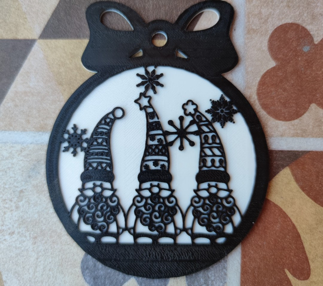 Christmas bauble with peeking elves