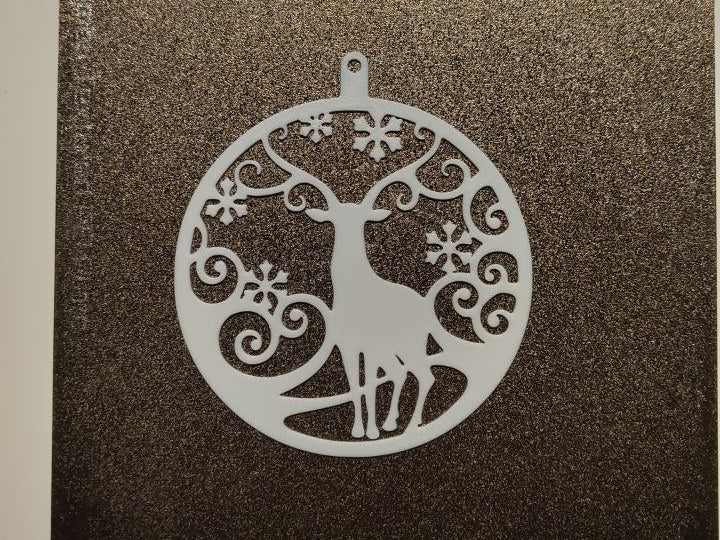 Flat Christmas bauble with reindeer motif