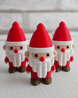 Cute Santa Claus keychain charm with a hole in the hat
