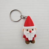 Cute Santa Claus keychain charm with a hole in the hat