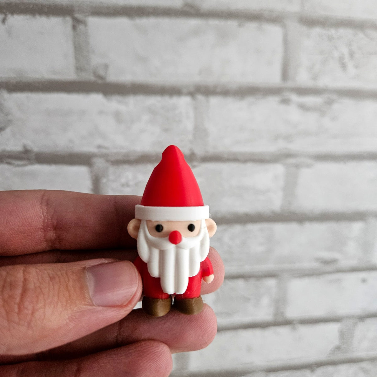 Cute Santa Claus keychain charm with a hole in the hat