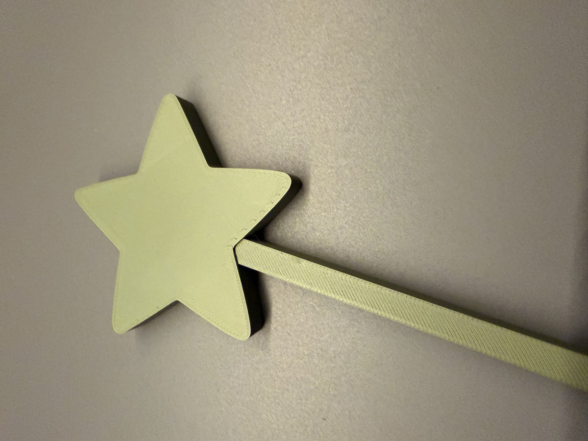 Christmas star on a stick for a plant pot