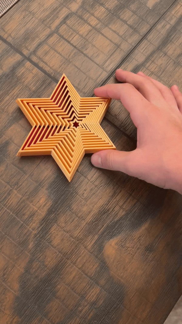 Foldable six-pointed Christmas star in several colours
