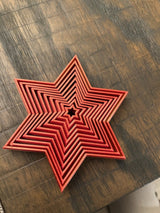 Foldable six-pointed Christmas star in several colours