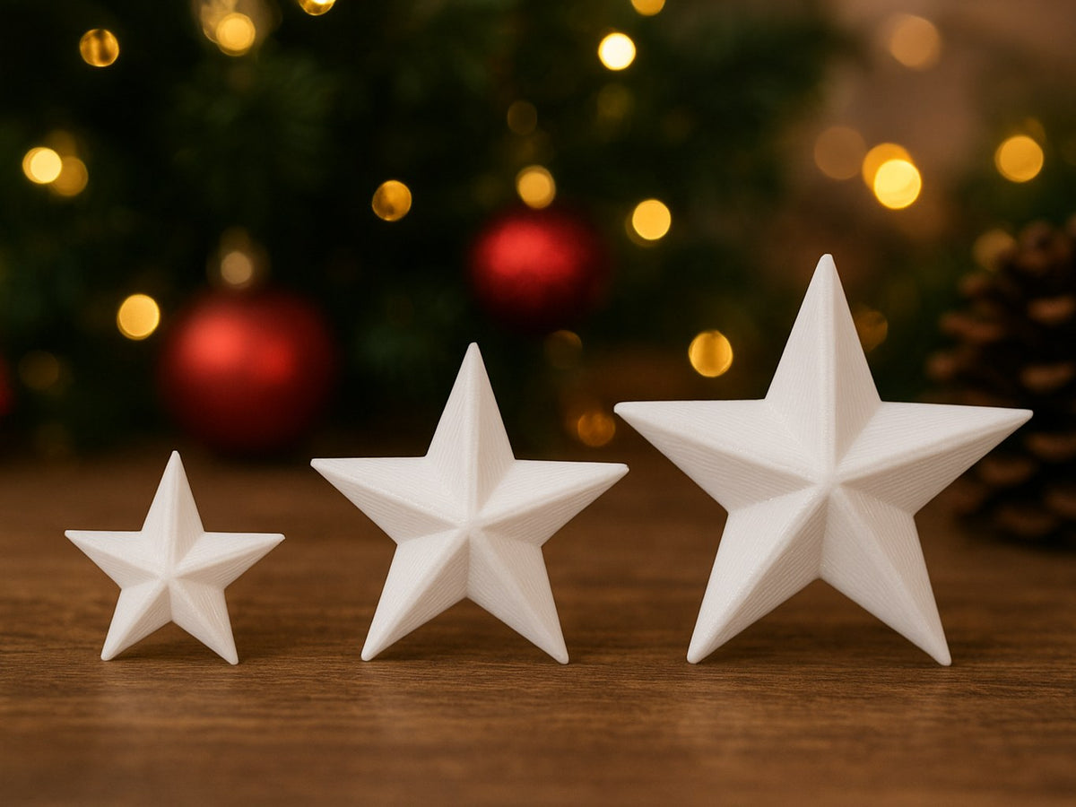 Three Christmas stars in sizes 3, 4 and 5 cm