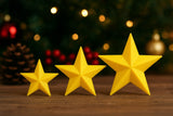 Three Christmas stars in sizes 3, 4 and 5 cm