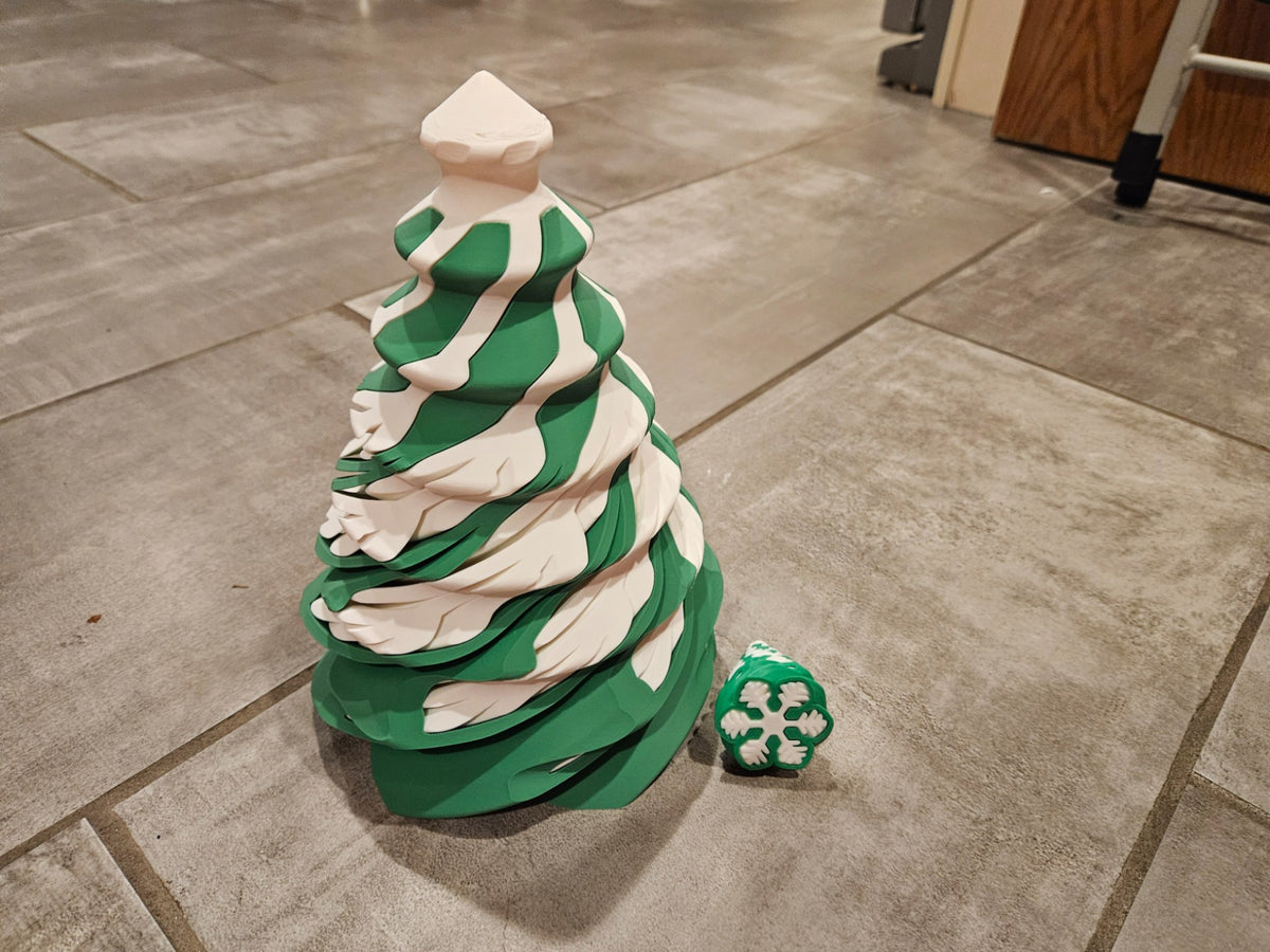Spiral Christmas tree fidget shaped as a snowflake and Christmas tree