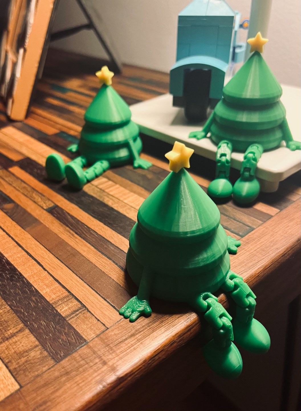 Small green Christmas tree figure with a yellow star