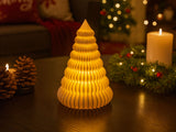 Ribbed Christmas tree with an LED tea light inside