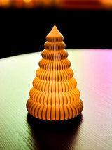 Ribbed Christmas tree with an LED tea light inside