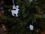Eight Christmas tree ornaments shaped like animals