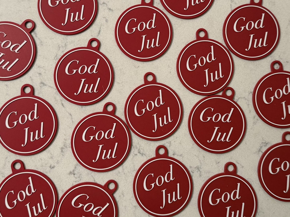 Elegant Christmas tree ornament with the text God Jul
