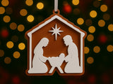 Christmas tree ornament with nativity: Mary, Joseph and baby Jesus