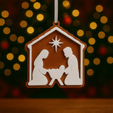 Christmas tree ornament with nativity: Mary, Joseph and baby Jesus