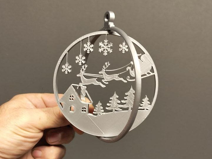 Christmas tree ornament with Santa on his way