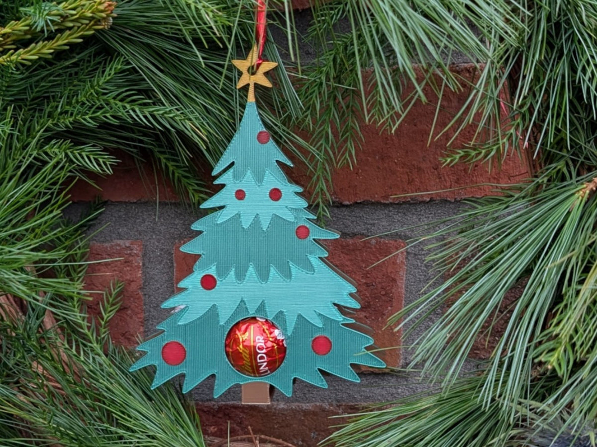 Christmas tree ornament that hides a chocolate ball