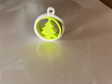 Green Christmas tree in a white ring as a tree ornament