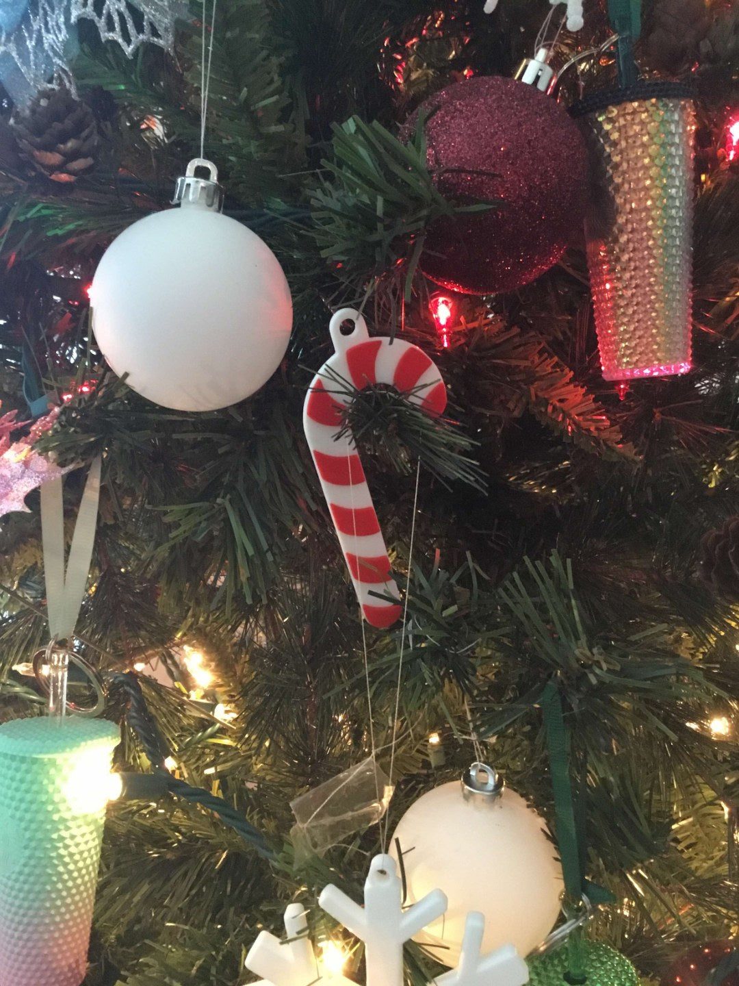 Christmas tree ornament shaped like a candy cane