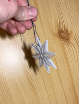 Star-shaped Christmas tree ornament