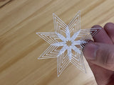 Star-shaped Christmas tree ornament