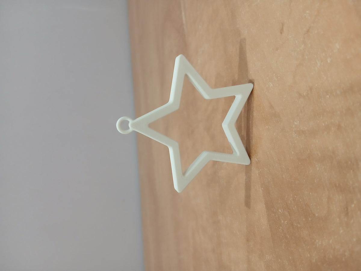 Minimalist star Christmas tree ornament with hanging loop