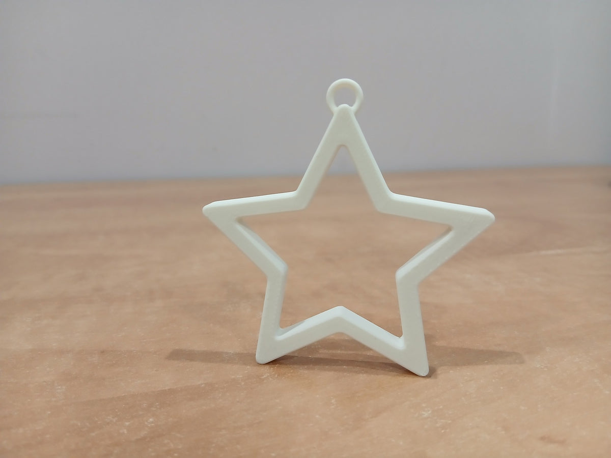 Minimalist star Christmas tree ornament with hanging loop