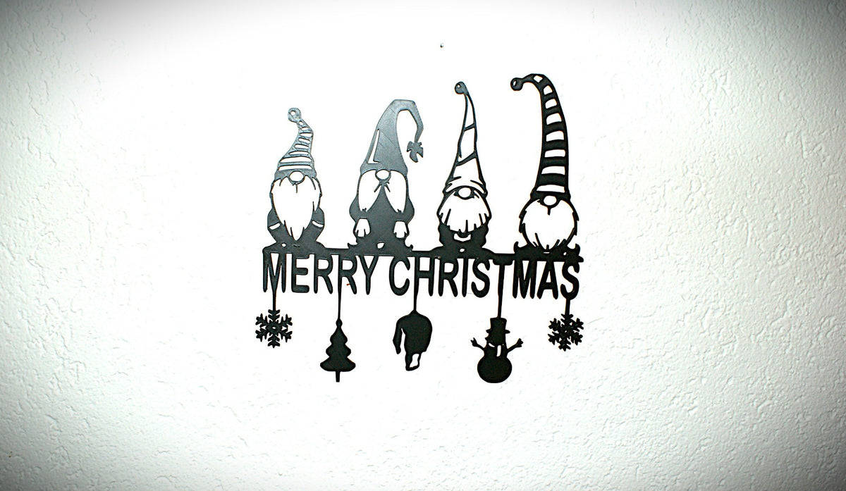 Wall decoration with 4 Christmas gnomes and a holiday greeting