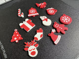 Twelve keyrings with Christmas motifs
