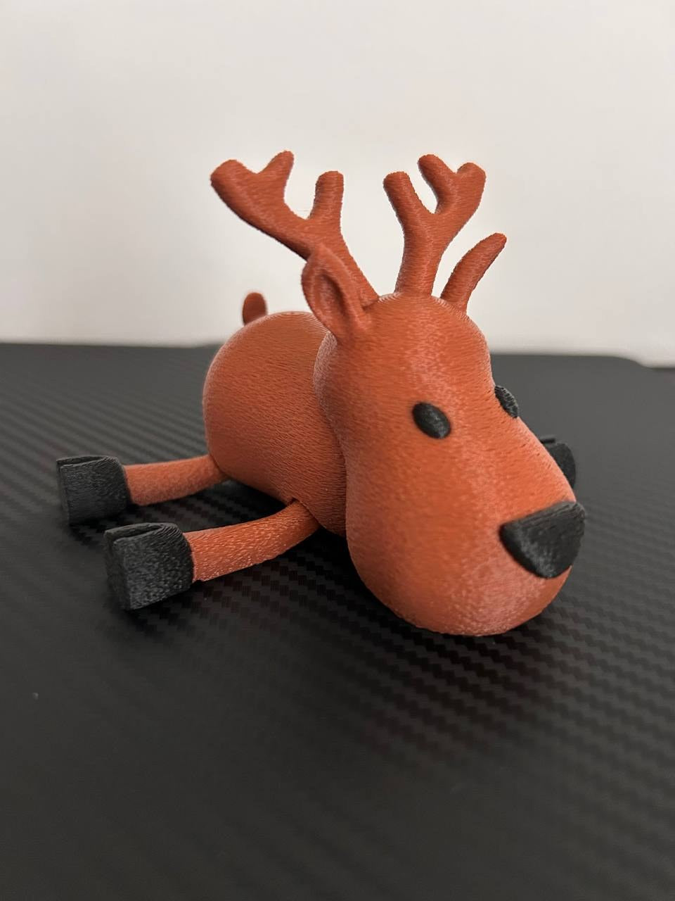 Cute articulated reindeer in two colours