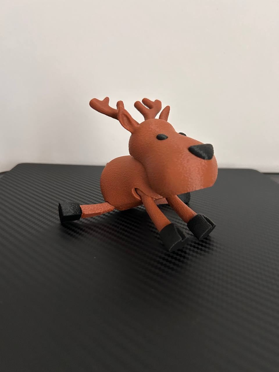 Cute articulated reindeer in two colours