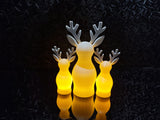 Reindeer figure with textured surface and LED tea light