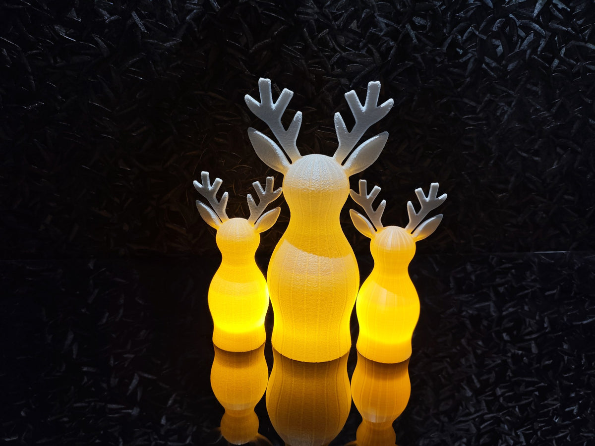 Reindeer figure with textured surface and LED tea light