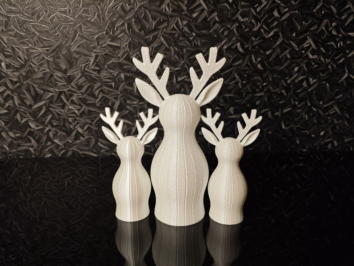 Reindeer figure with textured surface and LED tea light