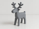Minimalist reindeer figure with clean lines