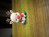 Cute reindeer with a red nose and scarf